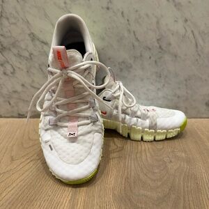 Nike Metcon Free 5 in white and neon green.